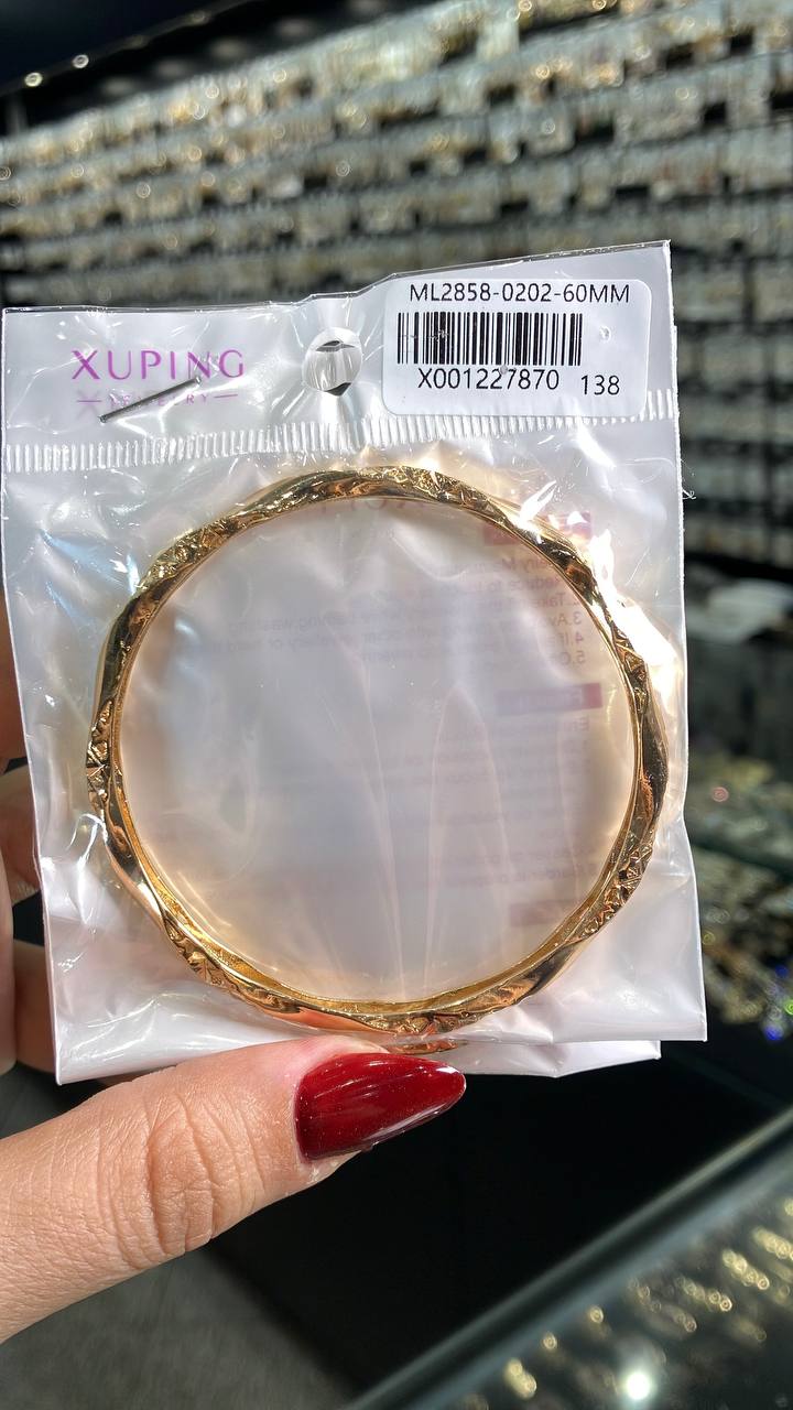 تصویر النگو ژوپینگ اورجینال مدل فیوژن در بستهبندی اصلی با کد مدل ML2858-0202-60MM و تراشهای هندسی طلایی