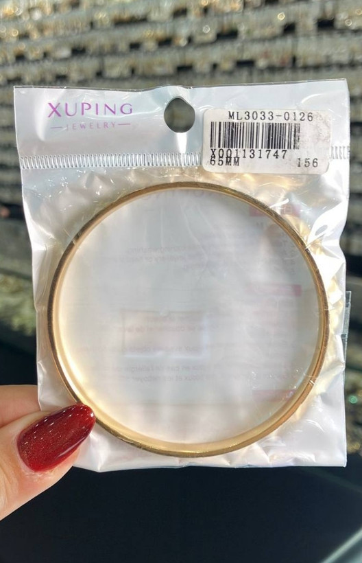 تصویر بستهبندی اورجینال النگو ژوپینگ با آبکاری طلایی، کد مدل ML3033-0126 و برچسب مشخصات محصول